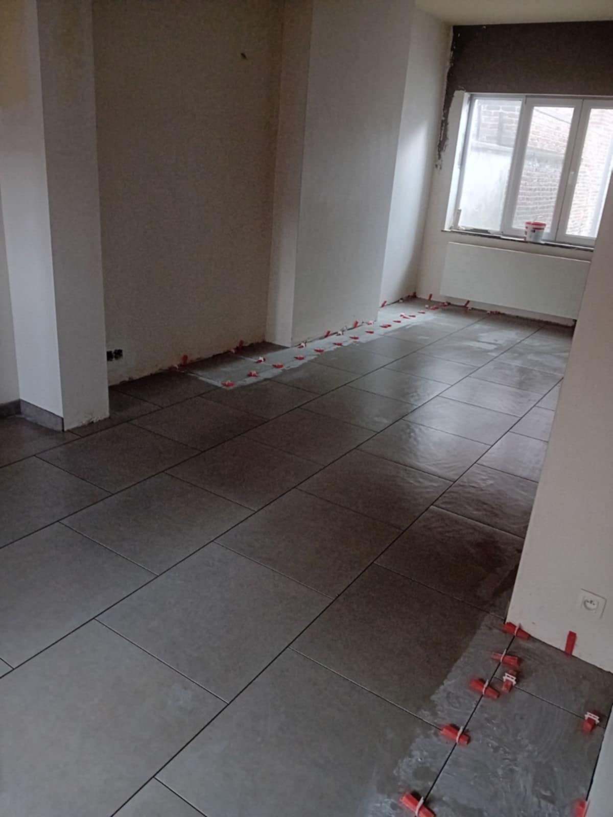 Travaux de parachèvement dans une habitation à Angleur